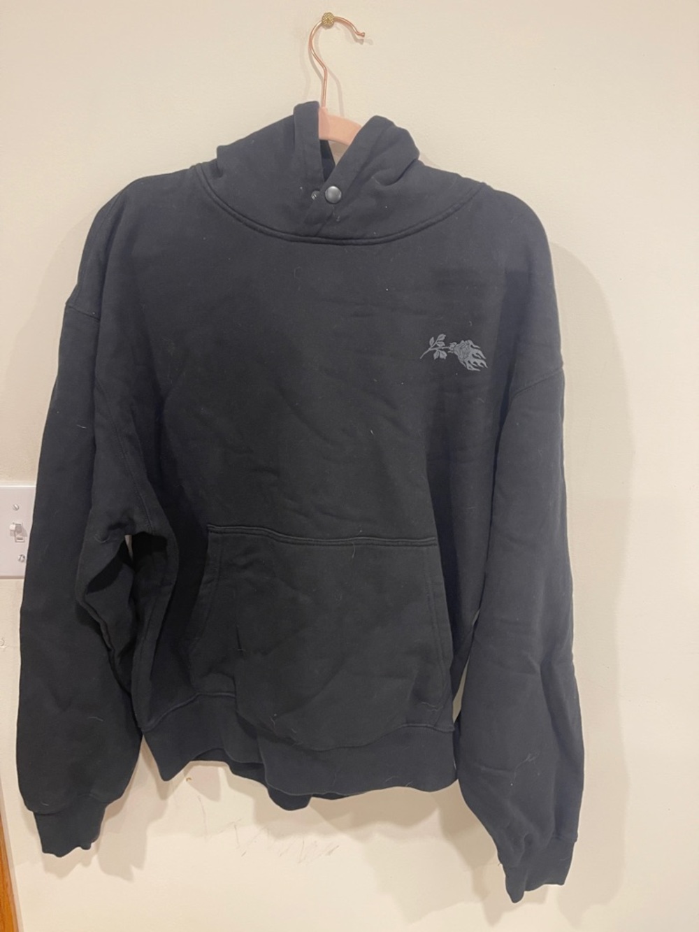 Men's Black Pullover Hoodie with Small Chest Graphic